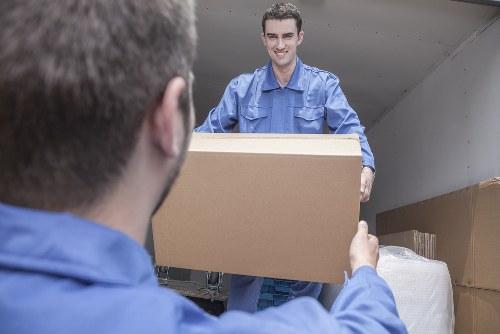 Removal crew preparing moving boxes