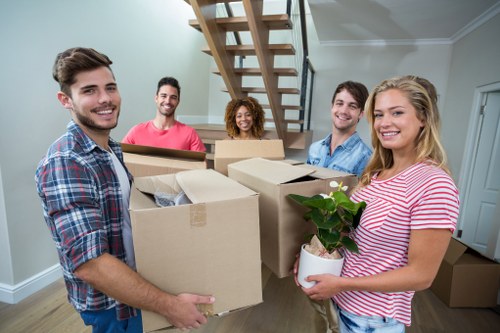 Professional movers working in a Haringey flat move