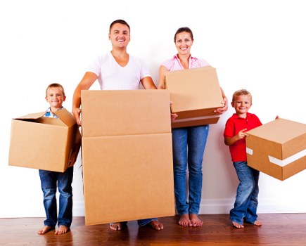 Packed boxes and furniture prepared for a local move in North London