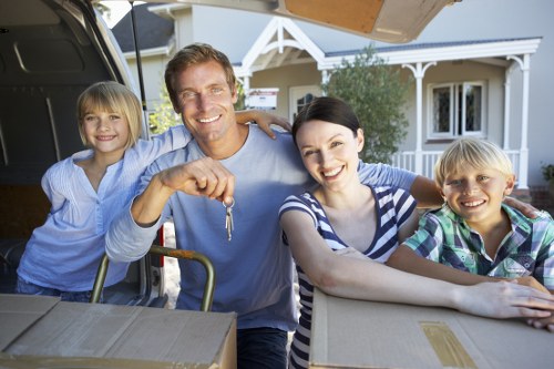 Professional movers handling furniture with care in Haringey