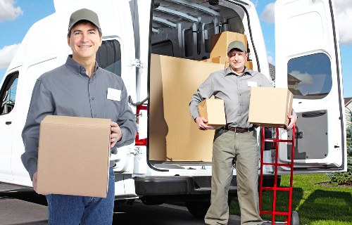 Furniture and boxes loaded into a moving van