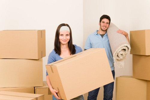 Local movers handling furniture in a flat conversion in Haringey