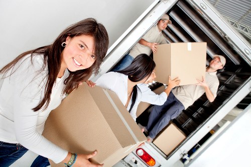 Preparation checklist and labelled boxes for a business move in Haringey