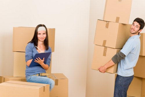 Packed boxes and furniture prepared for a local house move in Haringey